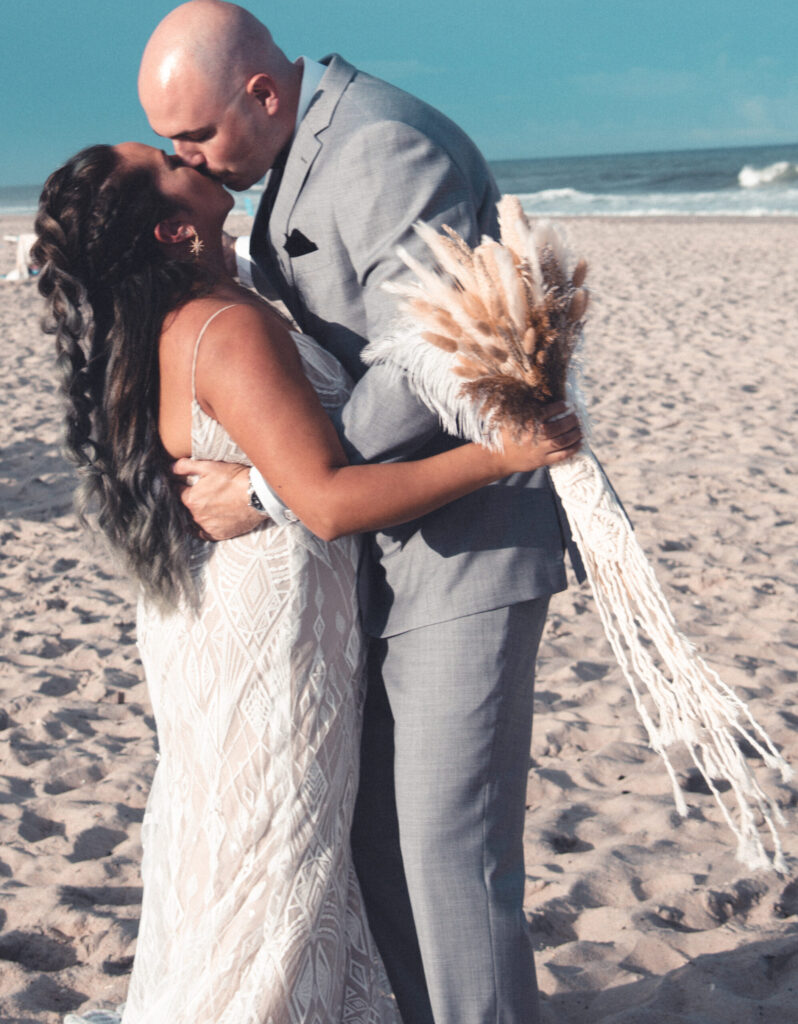 https://cdn.sunnybeachweddings.com/wp-content/uploads/2021/09/26235141/Bohohemian-Style-Beach-Wedding-by-Sunny-Beach-Weddings-25-scaled-798x1024.jpg